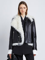 Cropped front image of model in Leather Shearling Motorcycle Jacket in black