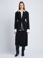 Front full length image of model wearing Wool Twill Skirt in BLACK