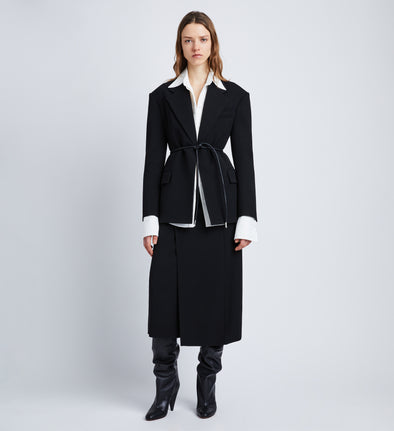 Front full length image of model wearing Wool Twill Skirt in BLACK