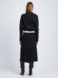 Back full length image of model wearing Wool Twill Skirt in BLACK