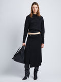 Front full length image of model wearing Wool Twill Skirt in BLACK