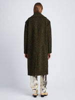 Back full length image of model wearing Melange Wool Boucle Coat in FAWN