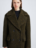 Detail image of model wearing Melange Wool Boucle Coat in FAWN