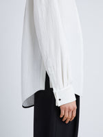 Detail image of model wearing Crushed Matte Satin Shirt in WHITE