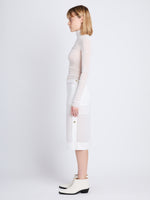 Side full length image of model wearing Technical Chiffon Skirt in IVORY