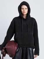 Front cropped image of model wearing Technical Boucle Knit Hoodie in CHARCOAL