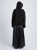 Back full length image of model wearing Technical Boucle Knit Hoodie in CHARCOAL