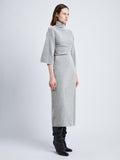 Side full length image of model wearing Viscose Wool Knit Dress in LIGHT GREY MELANGE
