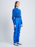 Side full length image of model wearing Viscose Wool Sweater in AZURE
