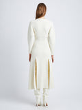 Back full length image of model wearing Wool Viscose Boucle Dress in IVORY