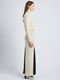 Side full length image of model wearing Technical Sequin Knit Skirt in ECRU