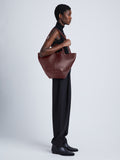 Image of model wearing Large PS1 Tote in BORDEAUX