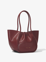 Side image of Carved Python Large Ruched Tote in BORDEAUX