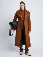Front full length image of model wearing Double Face Llama Wool Coat in UMBER
