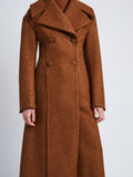 Detail image of model wearing Double Face Llama Wool Coat in UMBER