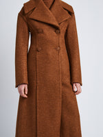 Detail image of model wearing Double Face Llama Wool Coat in UMBER