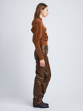 Side image of model in Nappa Leather Pants in Chestnut