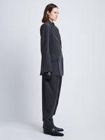 Side full length image of model wearing Melange Wool Jacket in GREY MELANGE