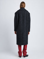 Back full length image of model wearing Melange Wool Boucle Coat in CHARCOAL