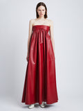Front image of model in Nappa Leather Strapless Dress in crimson