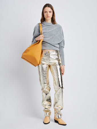 Front full length image of model wearing Metallic Leather Pants in PALE GOLD