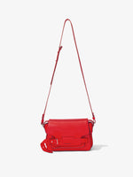 Front image of Beacon Saddle Bag in ROSSO with strap extended