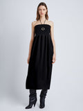 front image of model wearing viscose crepe knit dress in black