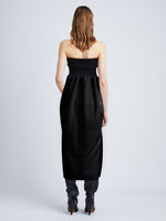 back image of model wearing viscose crepe knit dress in black