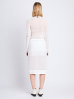 Back full length image of model wearing Viscose Gauze Knit Top in WHITE