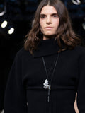 Image of model on runway wearing Horn Necklace in BLACK/GOLD