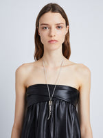 Proenza Schouler image of model wearing of Horn Pendant Necklace in silver/gold