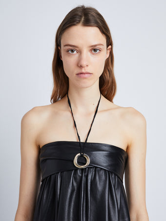 Image of model wearing 3 Ring Necklace in GOLD/GOLD/SILVER