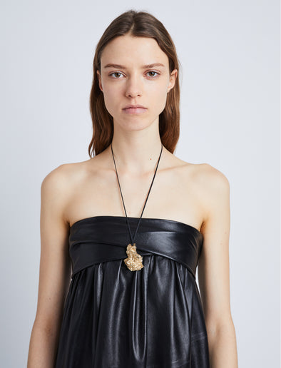 Image of model wearing Rock Necklace in GOLD