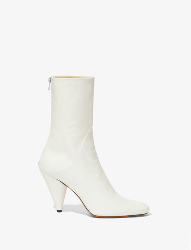 Front image of CONE ANKLE BOOTS in CREAM