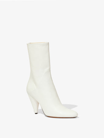 3/4 Front image of CONE ANKLE BOOTS in CREAM