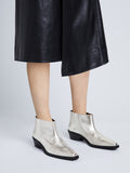 Image of model wearing BRONCO ANKLE BOOTS in SILVER