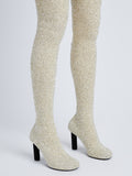 Image of model wearing GLINT OVER THE KNEE KNIT BOOTS in ECRU