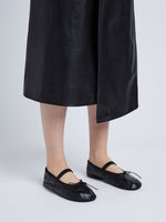 Image of model wearing GLOVE MARY JANE FLATS in BLACK