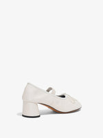 Back 3/4 image of Glove Mary Jane Pumps in natural
