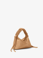 Side image of Mini Drawstring Bag in SAND