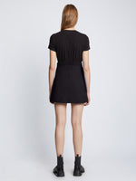 Back full length image of model wearing Tweed Wrap Skirt in BLACK