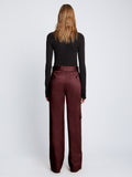 Back full length image of model wearing Cotton Twill Cargo Pants in PLUM