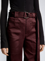 Detail image of model wearing Cotton Twill Cargo Pants in PLUM