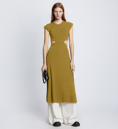 Front full length image of model wearing Pointelle Rib Cut Out Knit Dress in SULFUR styled over white Drapey Suiting Pants