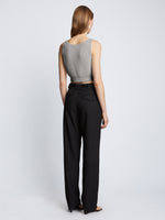 Back full length image of model wearing Ribbed Cotton Cropped Sweater in GREY MELANGE