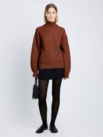 Full front image of model wearing Reversible Cotton Cashmere Sweater in BURGUNDY