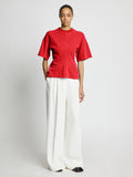 Front full length image of model wearing Eco Cotton Waisted T-Shirt in POPPY