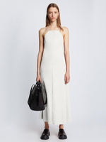 Front full length image of model wearing Drapey Suiting Cut Out Dress in OFF WHITE