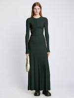 Front full length image of model wearing Long Sleeve Jersey Open Back Dress in PINE
