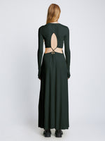 Back full length image of model wearing Long Sleeve Jersey Open Back Dress in PINE